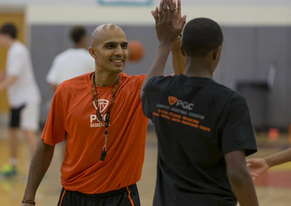 Coach with Player High Five